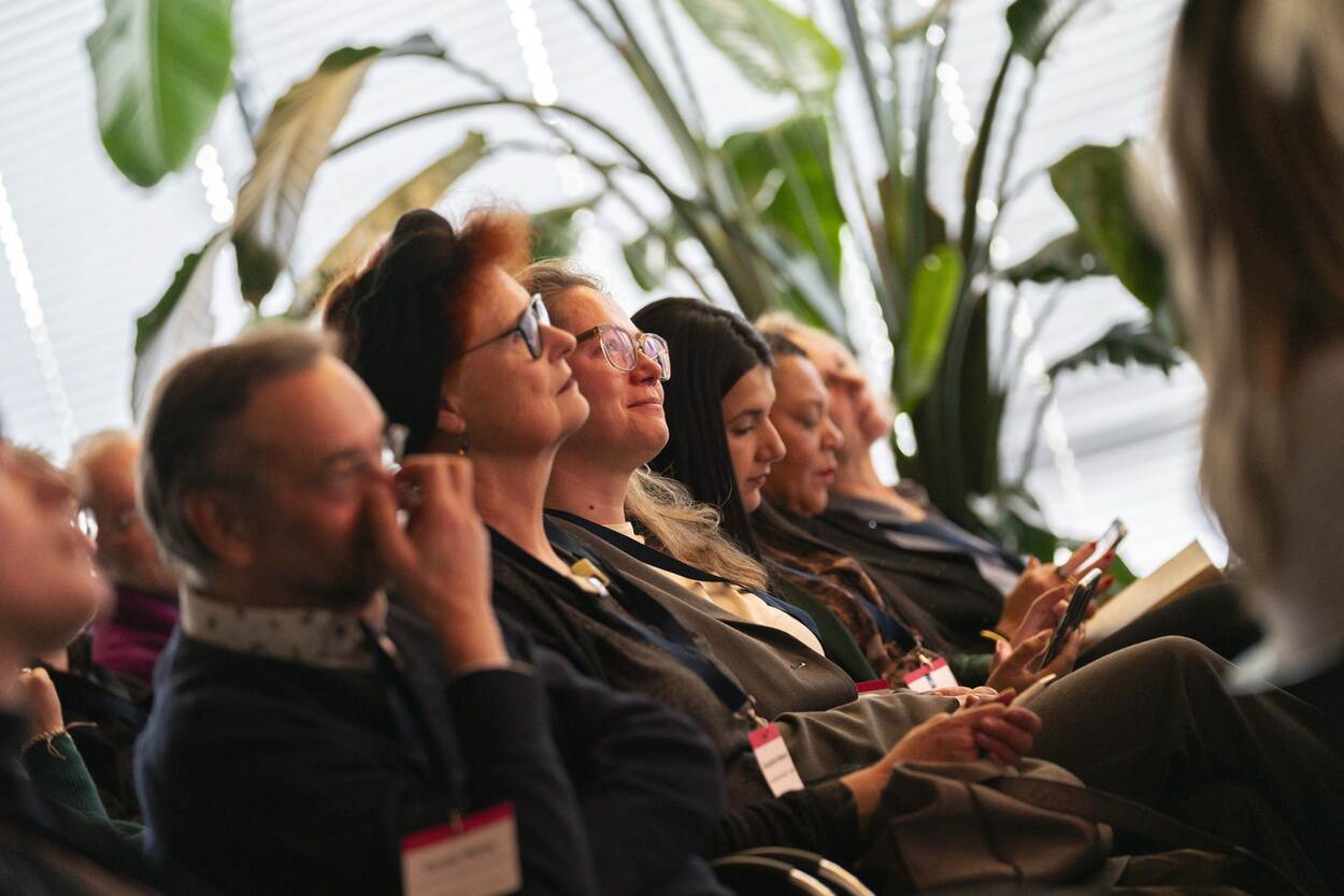 Deelnemers in de zaal